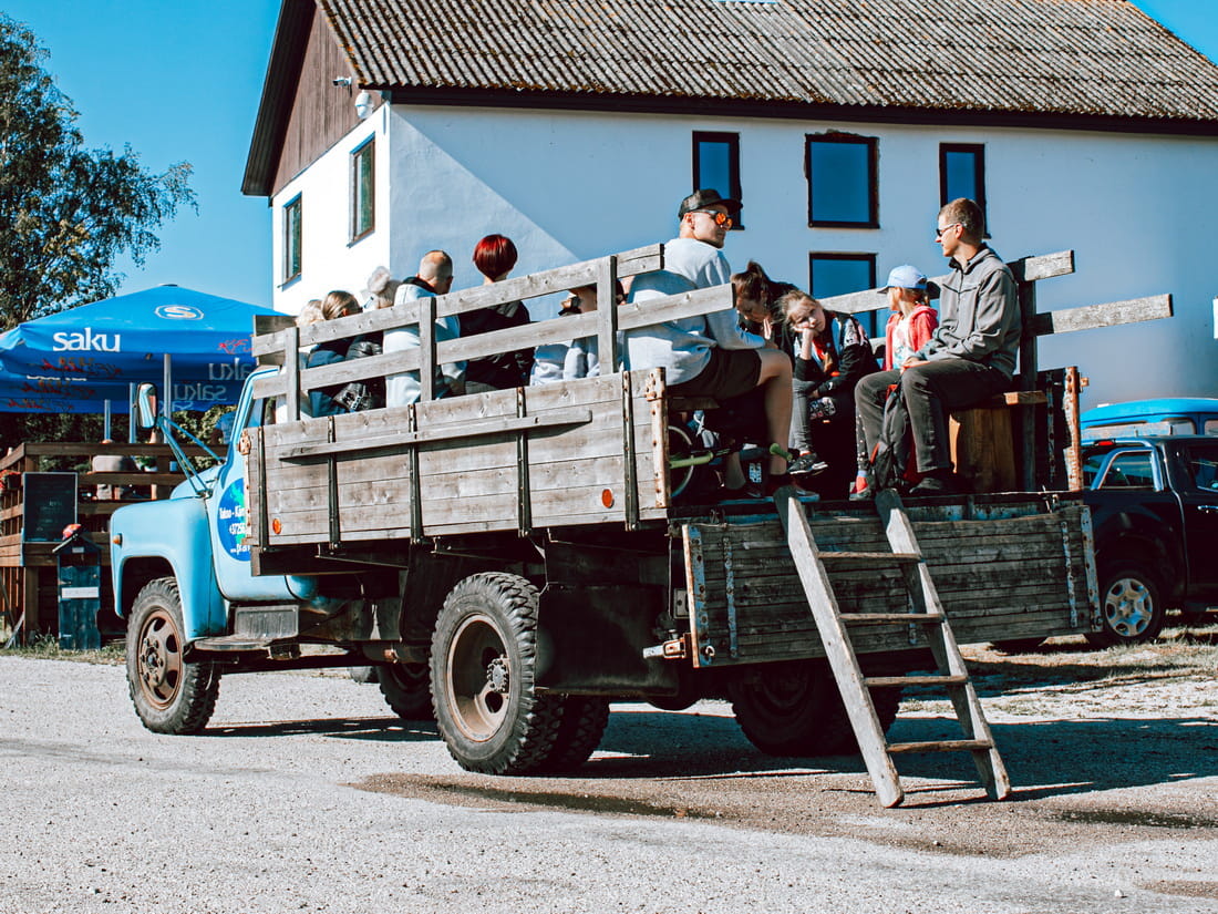 People riding Soviet truck Prangli