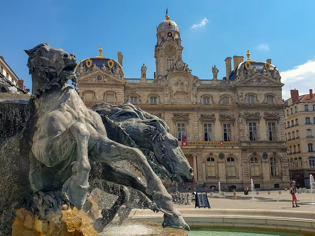 Photo taken near Place des Terreaux in Lyon, with the Bartholdi Fountain and City Hall in the background.