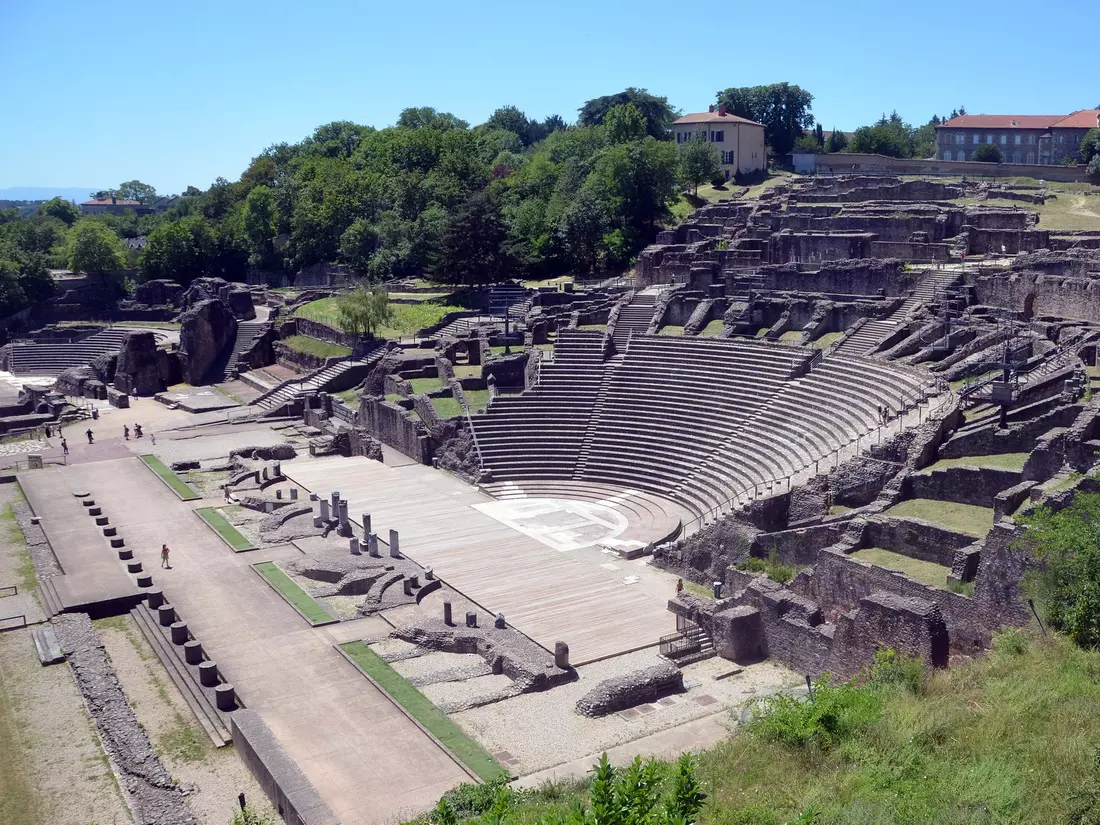 Ancient Roman amphitheatre in Lyon carved into Fourvière Hill, with rows of stone seating – one of the oldest in France.