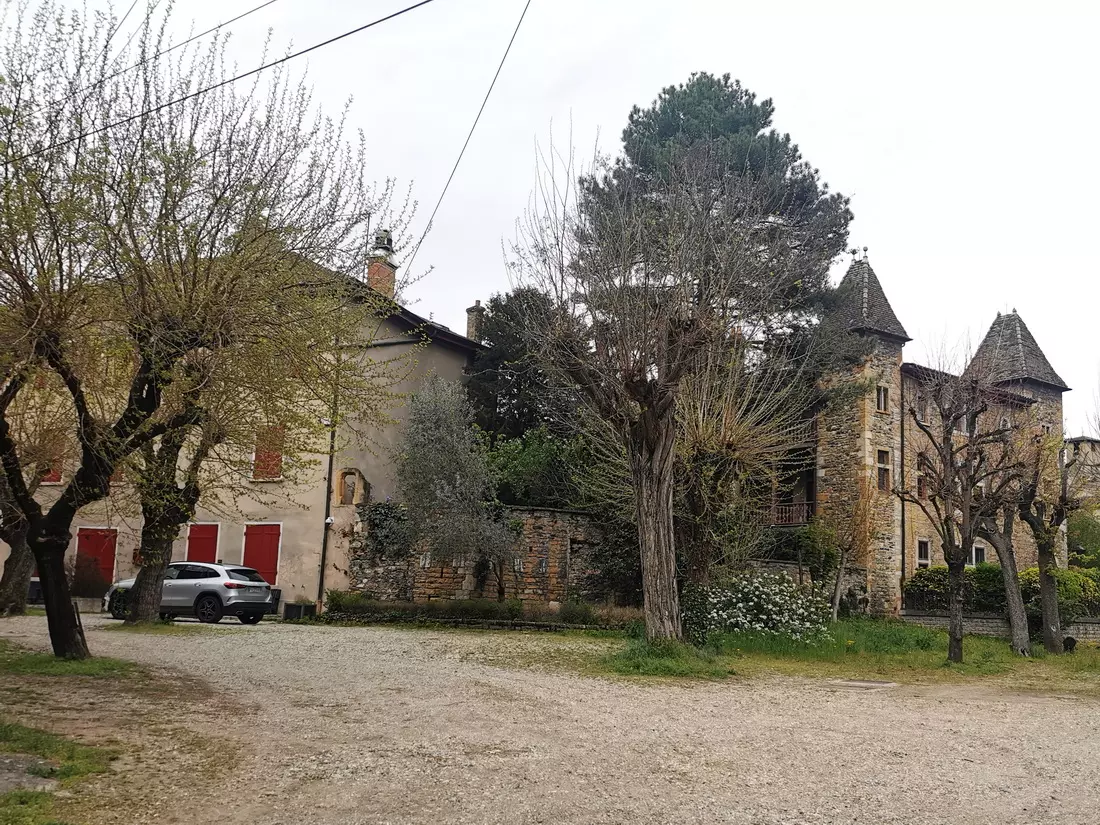 Entrance to the public area of Île Barbe, showing stone ruins and the boundary to private property.