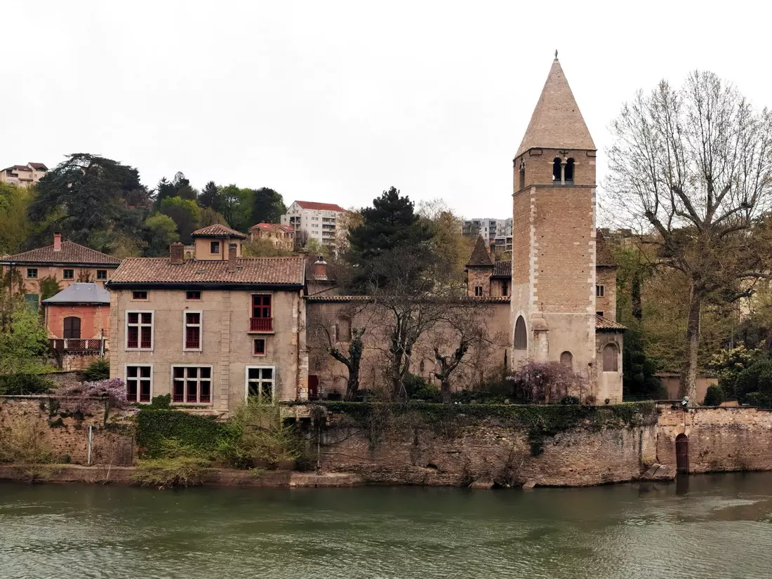 View of Île Barbe on an overcast day, highlighting the island’s medieval atmosphere near Lyon.