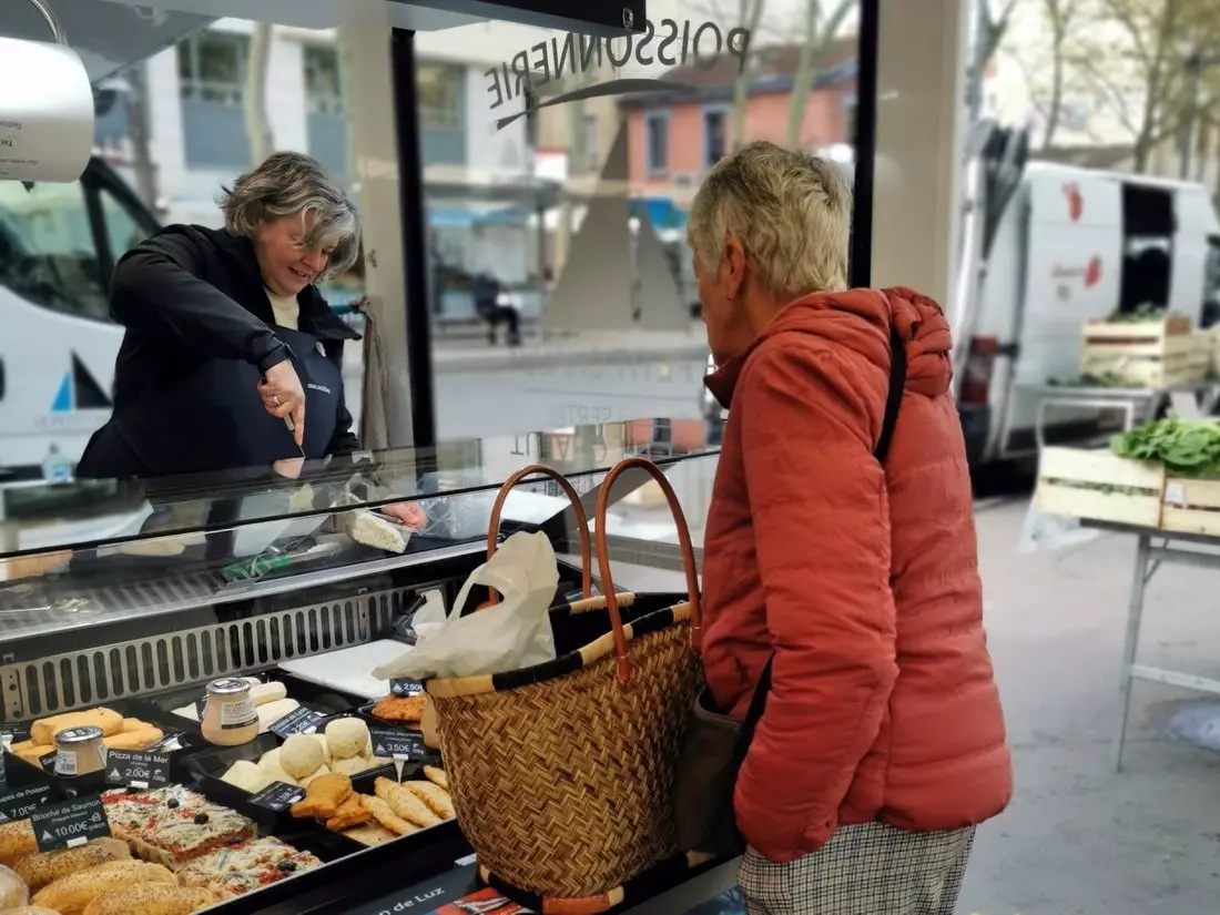 Selection of meat-based prepared foods at a market stall in Lyon’s Croix-Rousse.