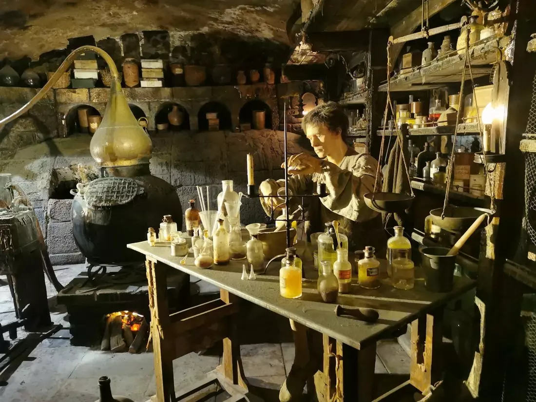 Miniature set from the movie Perfume at the Lyon museum, showing Grenouille’s workshop with bottles and lifelike details