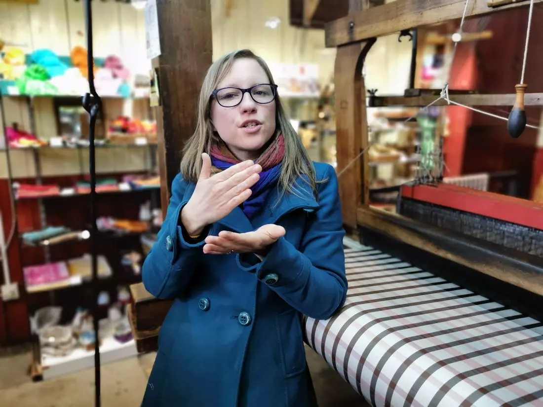 Guide at Maison des Canuts museum in Lyon talking about the city’s 19th-century silk industry.
