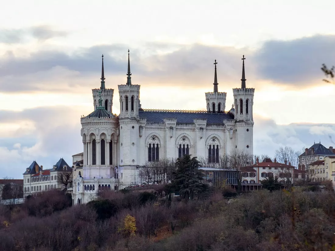 View of the Basilica of Fourvière from below, highlighting its thick towers.