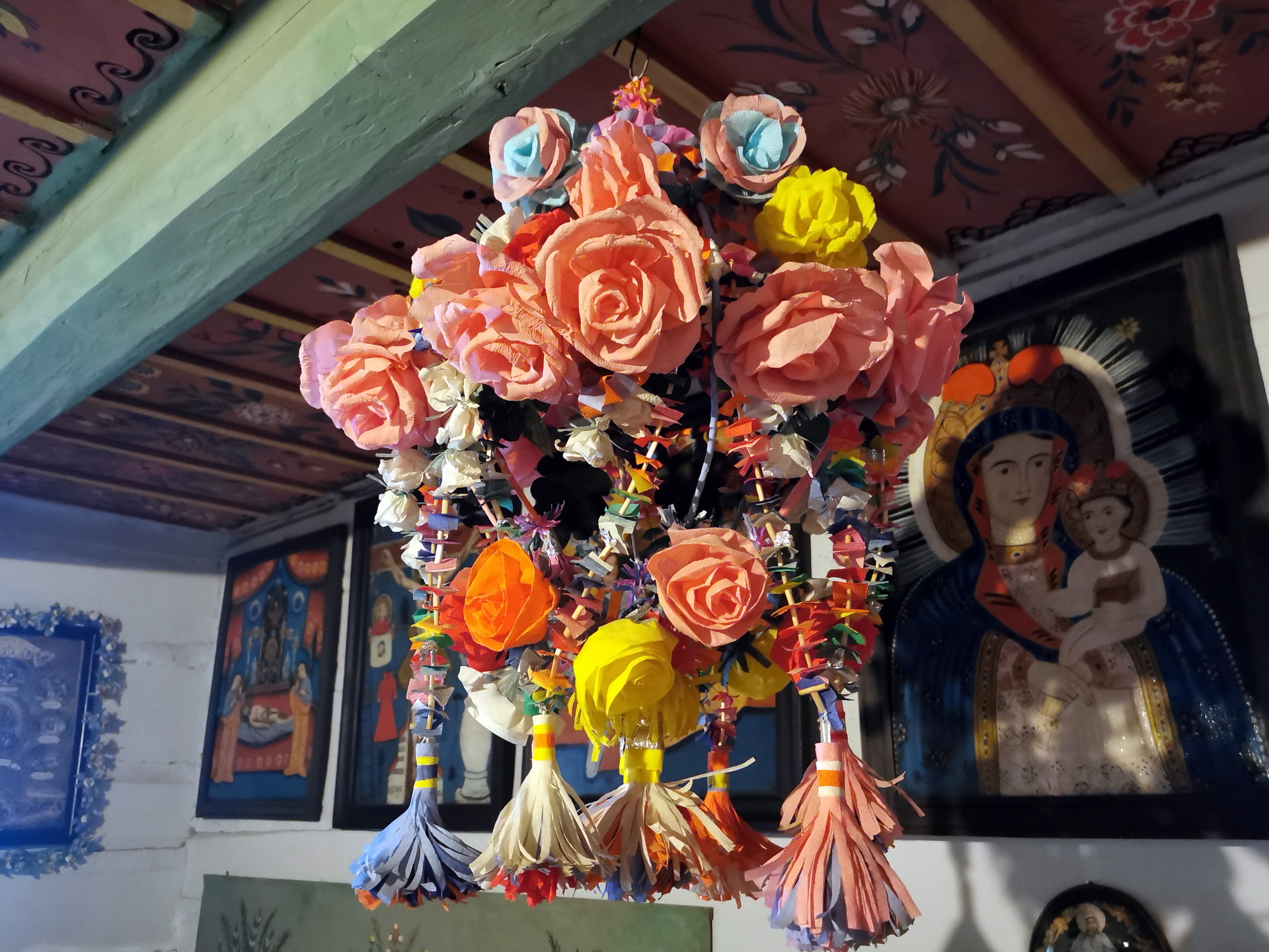 traditional paper flower decoration inside a rural interior at Krakow’s Ethnographic Museum