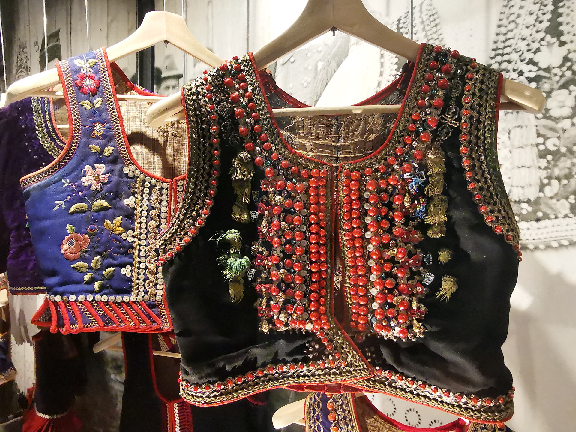 Polish black velvet waistcoats covered in red beads and embroidery