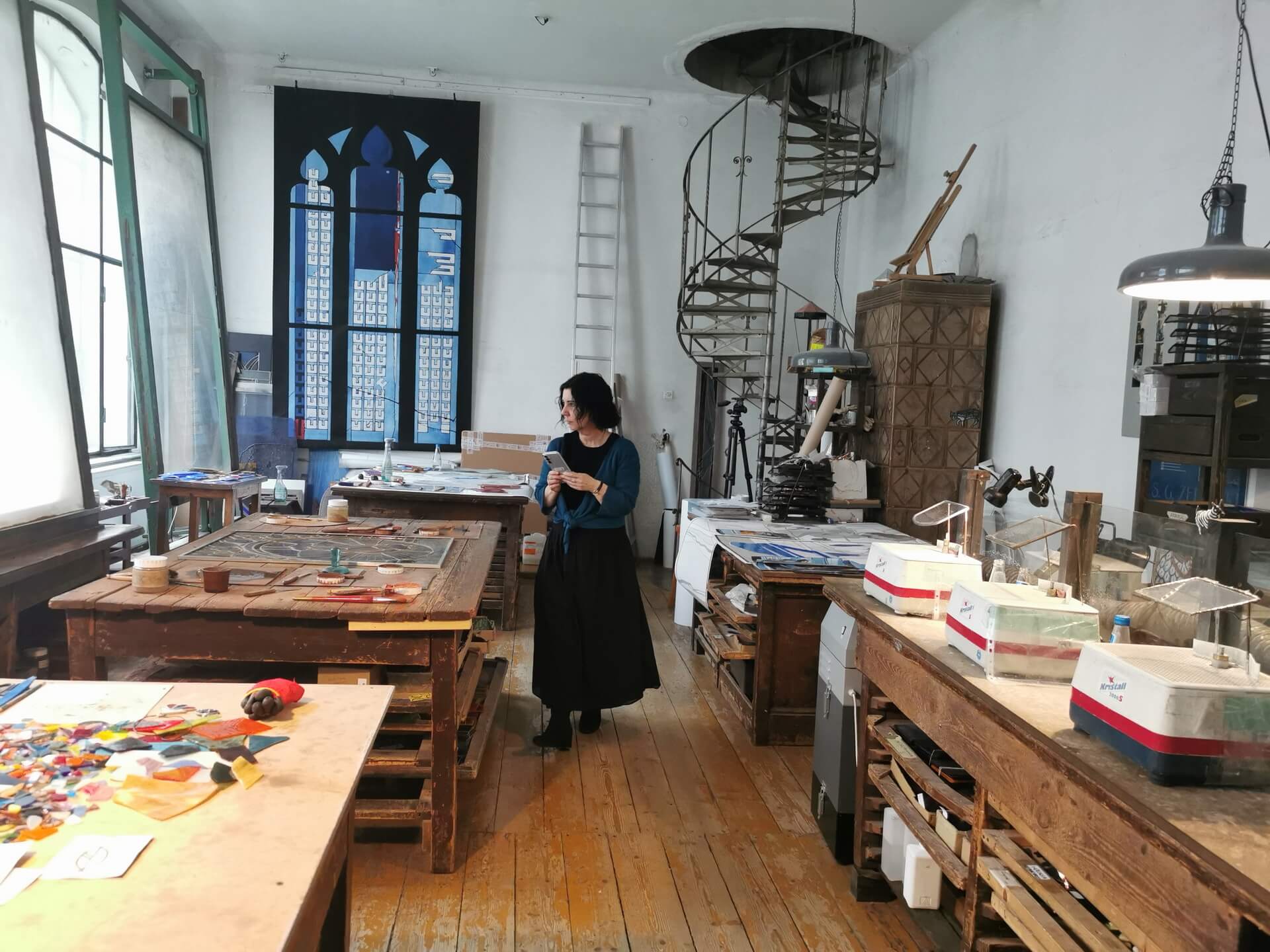 old wooden worktables in a historic stained glass studio