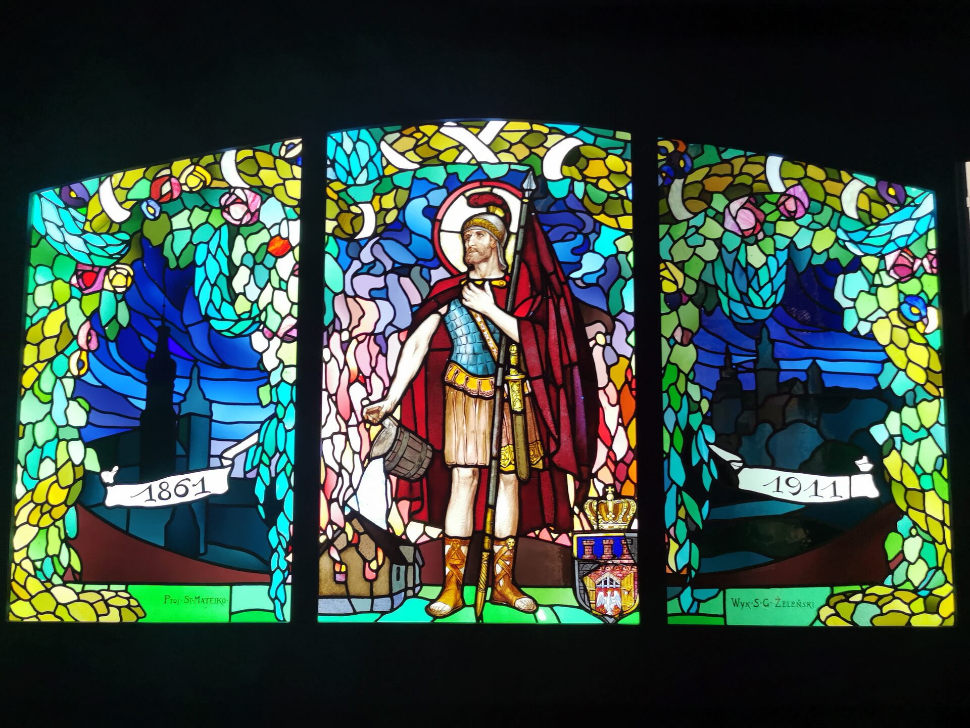 historic stained glass panel displayed in the museum
