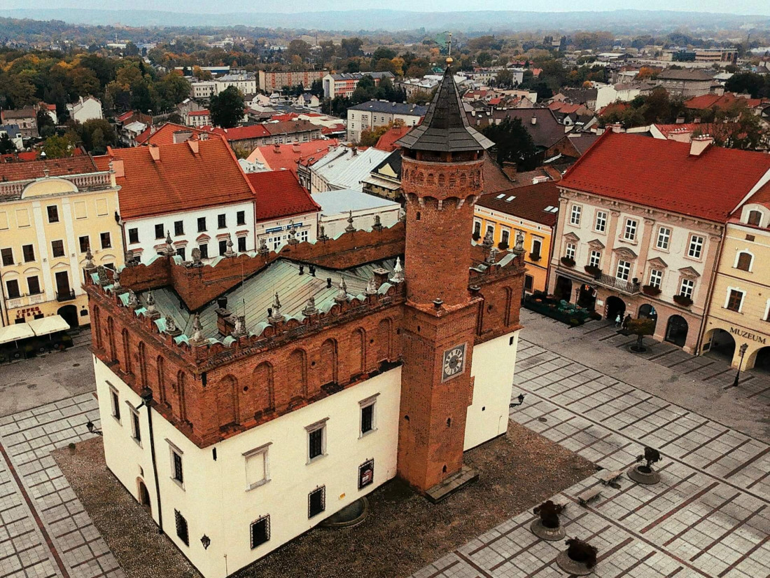 tarnów main square with renaissance town hall and red rooftops